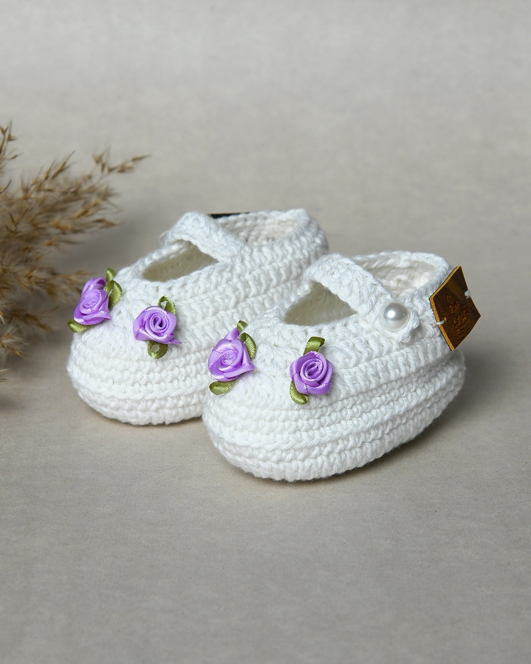 White Handmade Organic Thread Crochet Booties with Purple Floral Embellishment for Girls