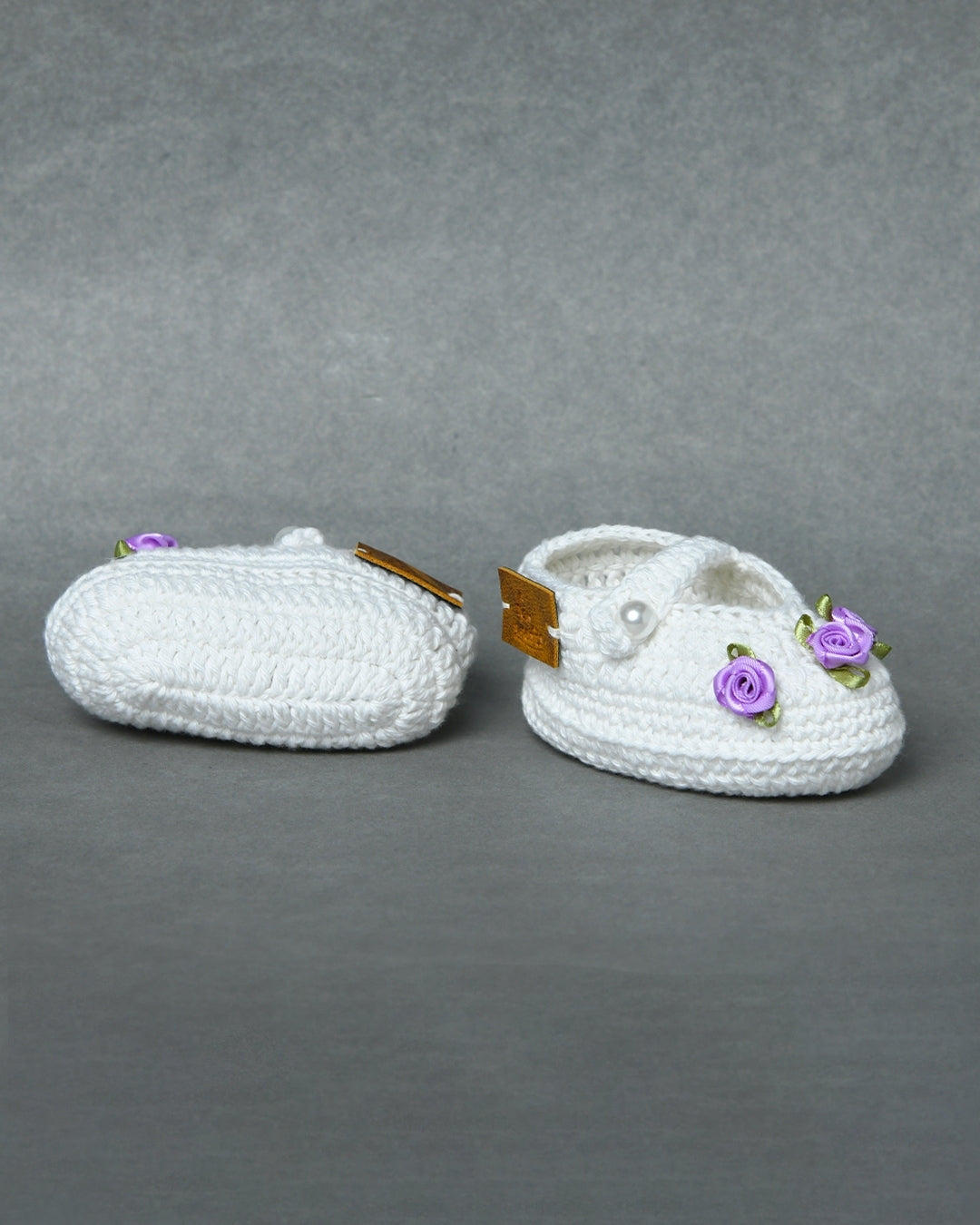 White Handmade Organic Thread Crochet Booties with Purple Floral Embellishment for Girls