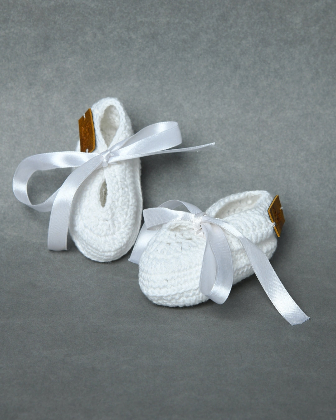 White Handmade Organic Thread Crochet Booties with Cute Bow Design