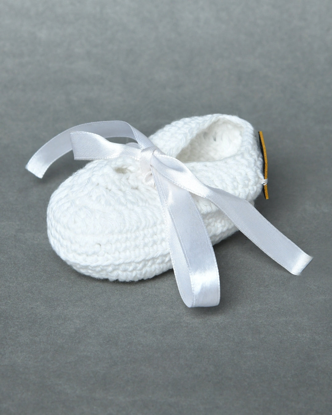 White Handmade Organic Thread Crochet Booties with Cute Bow Design
